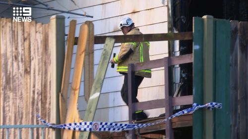 A body has been found following a suspicious house fire in Sydney's Macquarie Fields this morning.