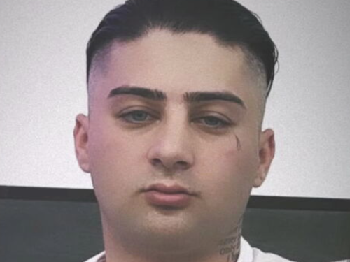The 21-year-old was ambushed in an execution-style shooting just metres from his family home.