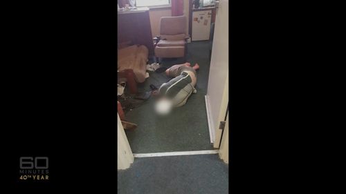 A student passed out drunk in the hallway. Picture: 60 Minutes