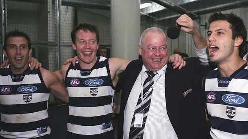 A lifelong Cats fan, Mr Wood celebrated with Geelong players after his return to Australia. (Getty) 