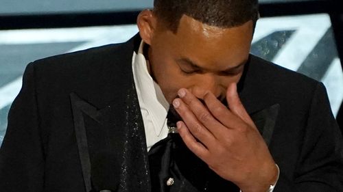 Will Smith cries as he accepts the award for best performance by an actor in a leading role for "king richard" at the Oscars