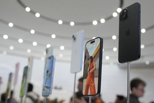 iPhone 15 phones are shown during an announcement of new products on the Apple campus in Cupertino, Calif., Sept. 12, 2023.   