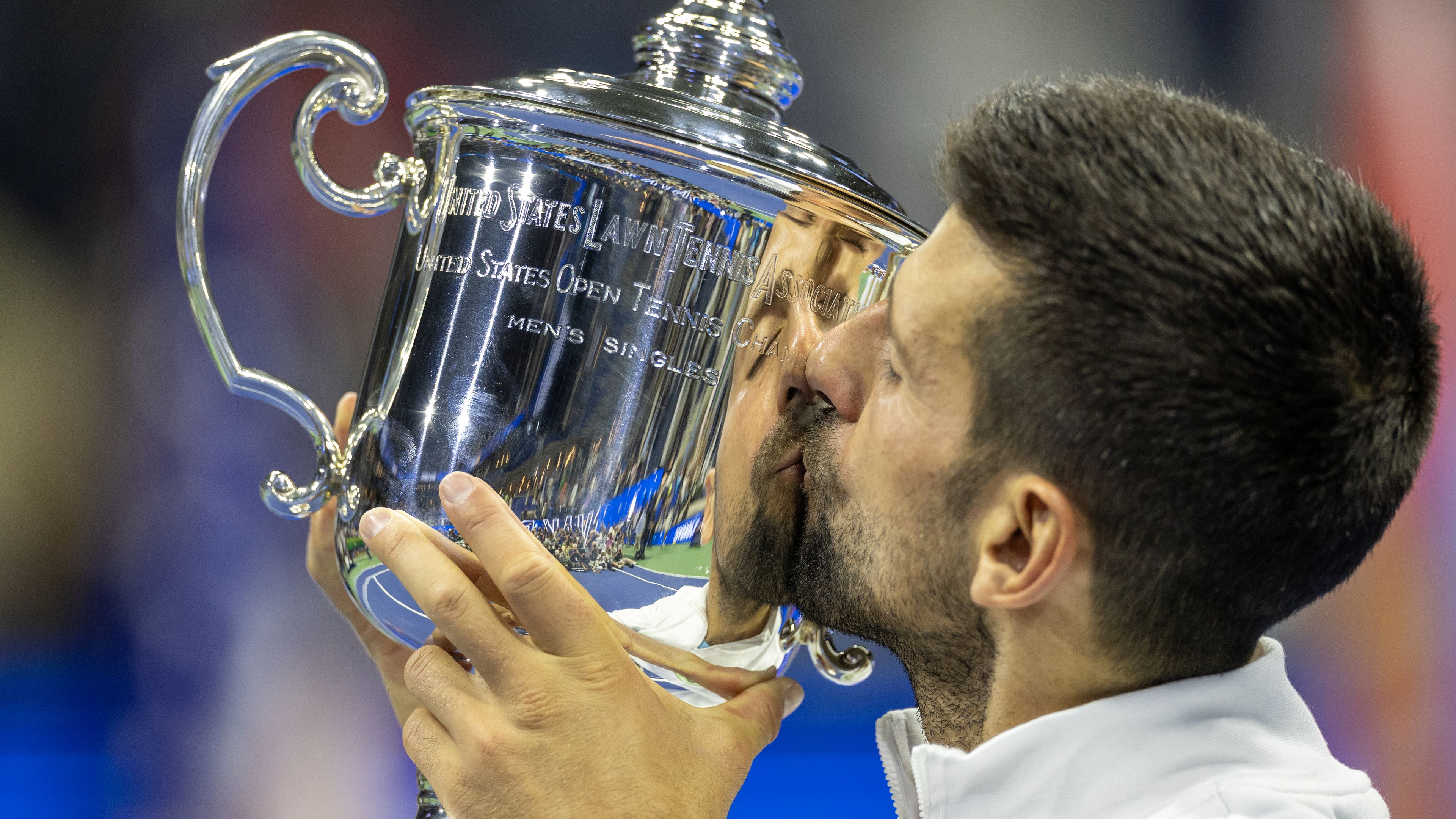 Novak Djokovic of Serbia with the winner&#x27;s trophy after his victory against Daniil Medvedev of Russia in the Men&#x27;s Singles Final on Arthur Ashe Stadium during the US Open Tennis Championship 2023 at the USTA National Tennis Centre on September 10th, 2023 in Flushing, Queens, New York City.  (Photo by Tim Clayton/Corbis via Getty Images)