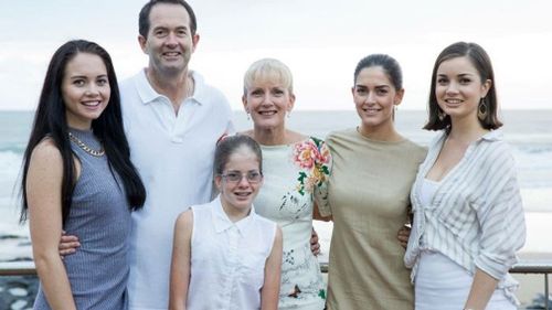 Andrew Wallace with his wife Leonie (right) and daughters including Caroline (left). (Photo: Supplied)