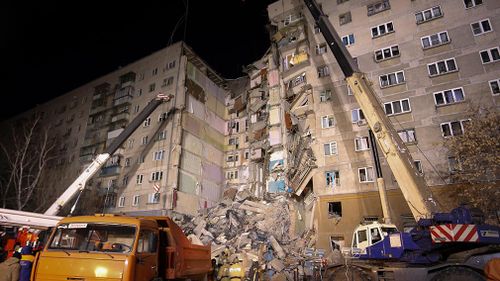 At least seven people have died after an apartment building's section collapsed from an apparent gas explosion in Russia's Ural Mountains region.
