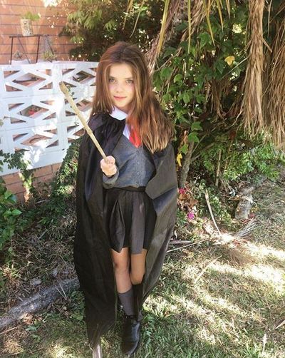 Hermione Granger from Harry Potter just needs a school uniform and a black cape from <a href="https://www.thebasewarehouse.com.au/black-cape-89cm.html" target="_blank" draggable="false">here</a>.