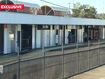 The woman, who cannot be named for legal reasons, said her 15-year-old daughter had been standing at the Beenleigh Train Station in Logan, south of Brisbane, when she was attacked by another teen.