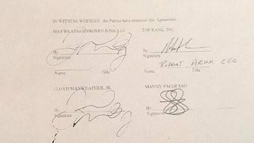 The pair posted photos online of the signed fight contract. (Supplied)