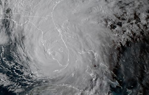 In this geocolor GOES-16 satellite image taken Sunday local time, the eye of Hurricane Irma moves up Florida's west coast. (AP)