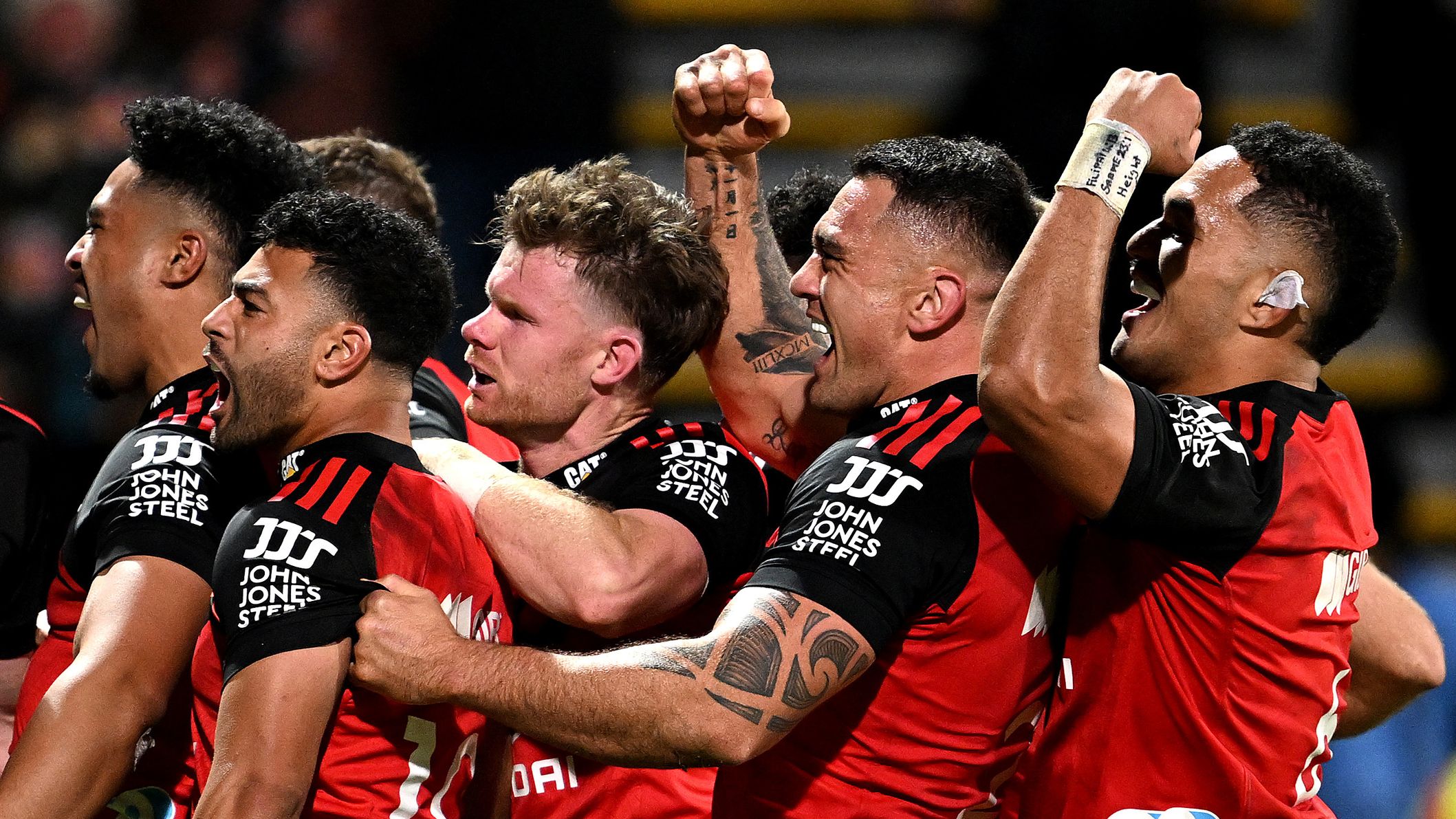 The Crusaders celebrate a try scored by Leicester Fainga&#x27;anuku during the Super Rugby Pacific Semi Final match against the Blues.