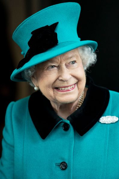 Queen Elizabeth II wearing green outfit