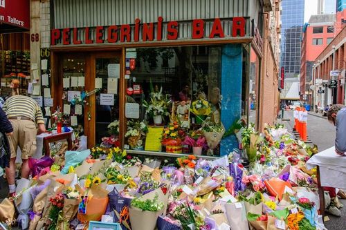 The doors of Pellegrini's were reopened at 8am and a line of mourning customers, some overwhelmed by tears, poured into the shop.