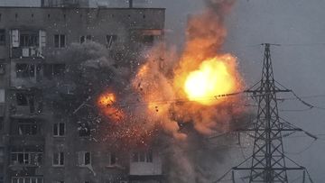 An explosion in an apartment building that came under fire from a Russian army tank in Mariupol, Ukraine, with the city being left without water, gas and electricity among the Russian attack. 
