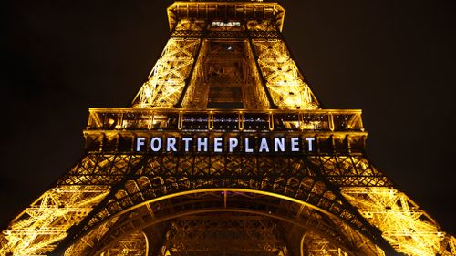 195 nations agree to fight global warming and reduce emissions in historic Paris pact