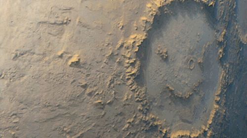 The famous Galle crater on Mars looks like a smiley face. (AAP)