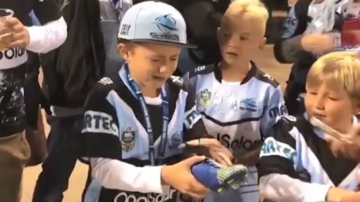 WATCH: Matt Moylan makes young Cronulla Sharks fan's day by giving away game-day boots