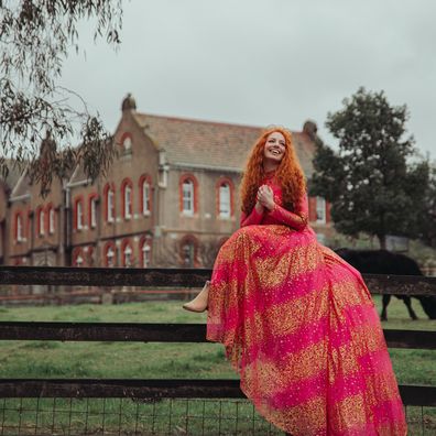 Emma Watkins poses for the Ovarian Cancer Research Foundation's (OCRF) Frocktober campaign.