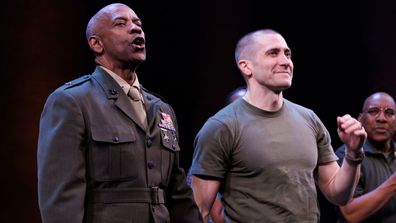 Denzel Washington and Jake Gyllenhaal participate in the curtain call for the Broadway opening night of William Shakespeare's "Othello" on March 23. **This image is for use with this specific article only** 