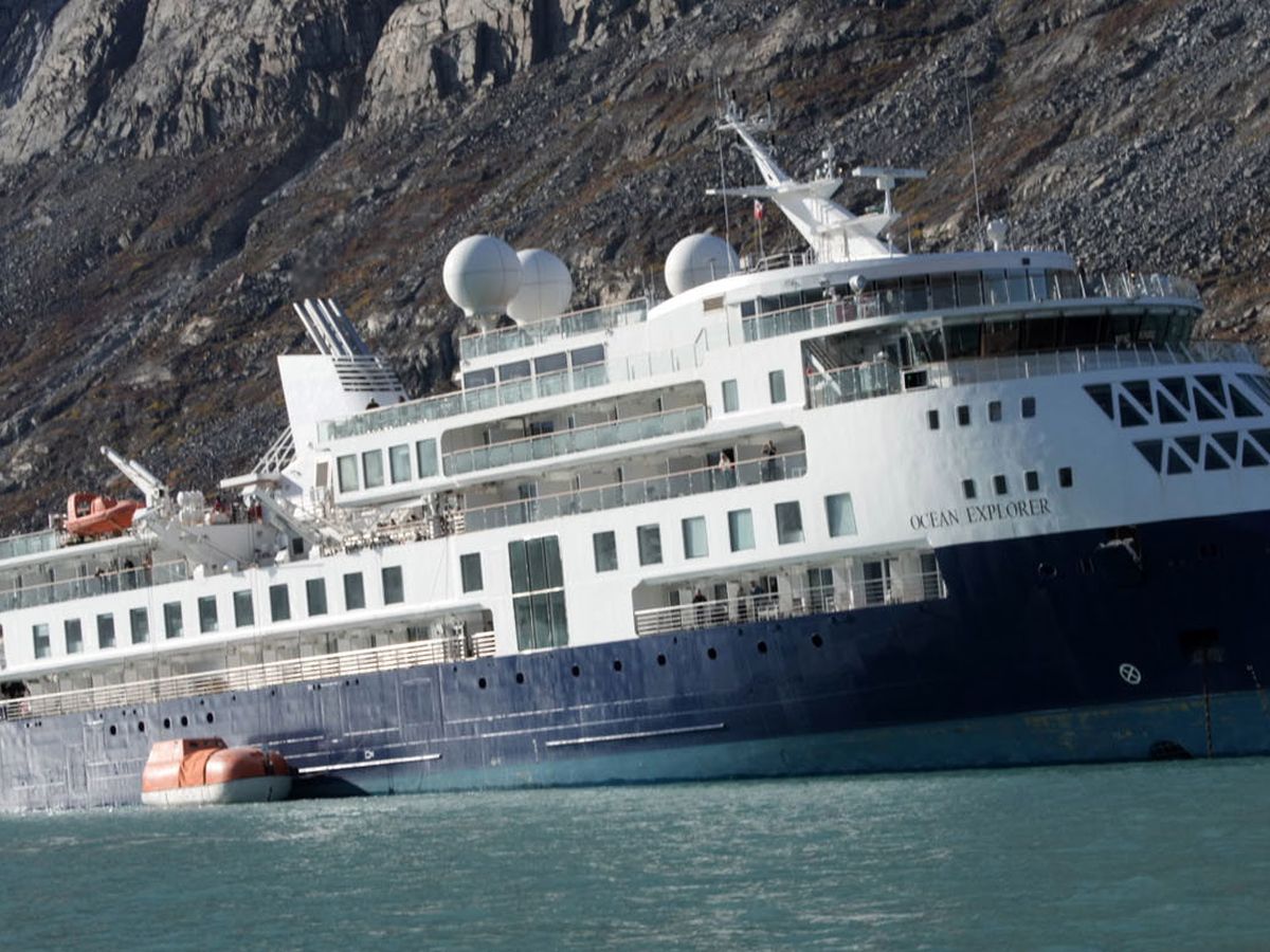 A fishing vessel in Greenland will try to free a cruise ship that ran  aground with 206 people