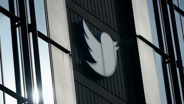 A Twitter logo hangs outside the company&#x27;s offices in San Francisco, Monday, Dec. 19, 2022. (AP Photo/Jeff Chiu)