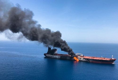 The crude oil tanker Front Altair on fire in the Gulf of Oman, 13 June 2019. 