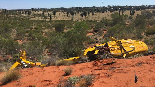 The helicopter was conducting a sunset tour of Uluru when it was forced to conduct an emergency landing. (Northern Territory Police)