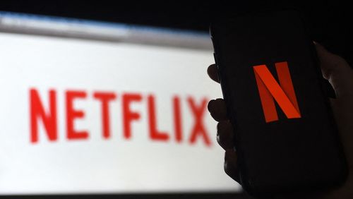 Netflix shed almost 1 million subscribers during the spring amid tougher competition and soaring inflation that's squeezing household budgets, heightening the urgency behind the video streaming service's effort to launch a cheaper option with commercial interruptions.