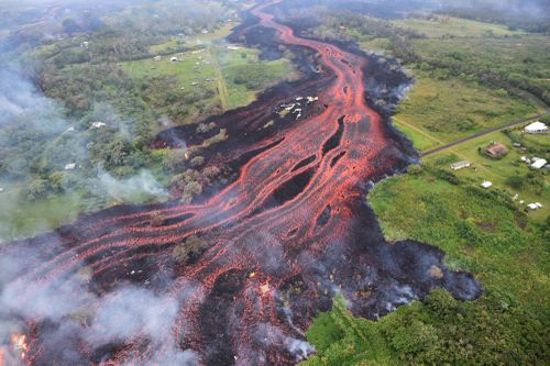 Thick lava flows from the volcano eruption are leaving gaping black scars across the countryside in Pahoa. (AAP)