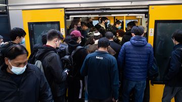 Crowds gather at Central Station in Sydney, as trains run on a reduced timetable as part of train drivers industrial action. 1st July 2022.