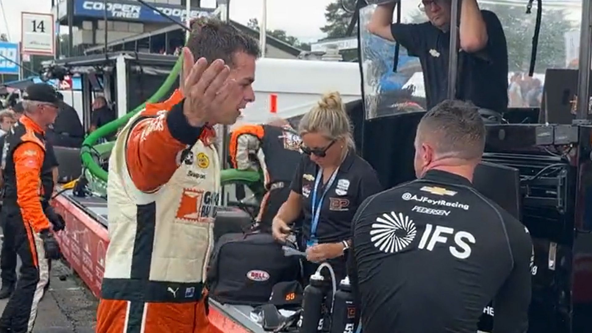 Scott McLaughlin speaks to Benjamin Pedersen after the IndyCar race at Mid-Ohio.