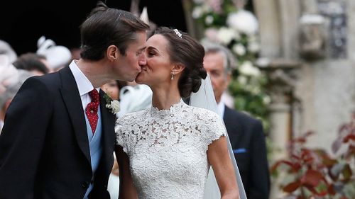 Pippa Middleton kisses her husband James Matthews. (AAP)