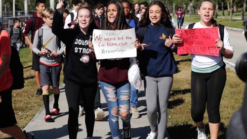 The students are calling for changes to gun laws in American. (AP)