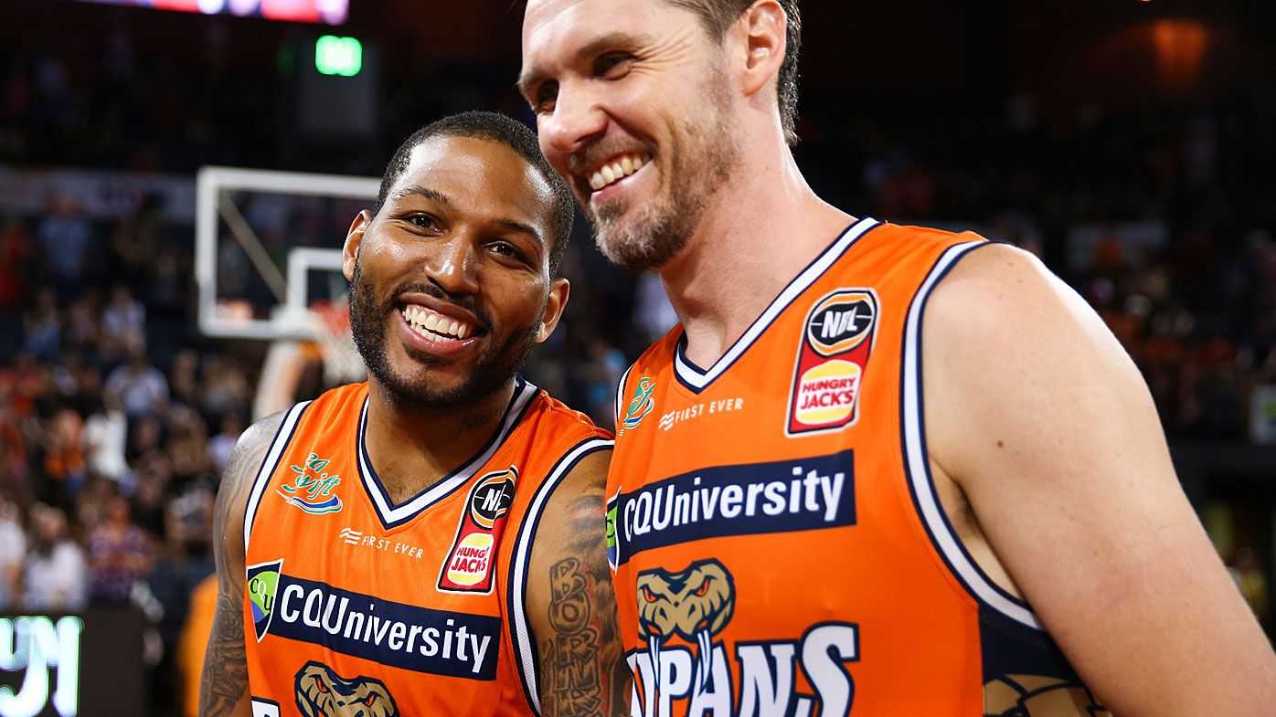 Cairns Taipans celebrate their win