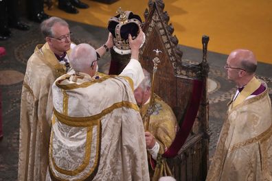 Britain's King Charles III is crowned with St Edward's Crown by The Archbishop of Canterbury Justin Welby during his coronation ceremony in Westminster Abbey, London, Saturday, May 6, 2023. (Aaron Chown/Pool Photo via AP)