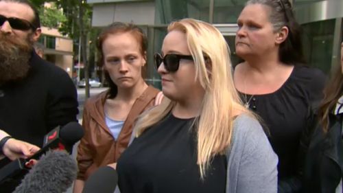 Toulson's family spoke outside court today. (9NEWS)