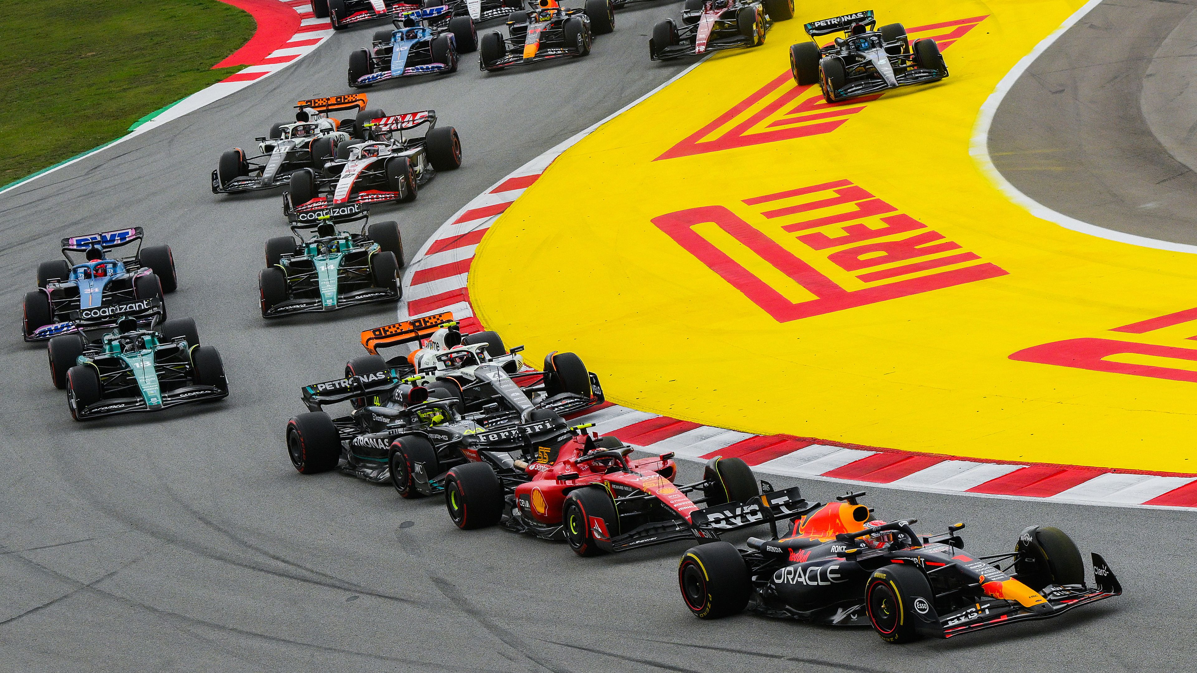 Max Verstappen leads Carlos Sainz and the rest of the field at the start during Formula 1 Spanish Grand Prix.