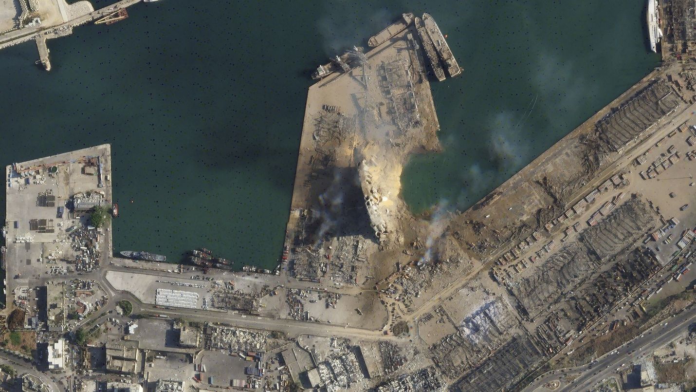 A combination of satellite images of the port of Beirut and the surrounding area in Lebanon, left, taken on May 31, 2020 and the bottom taken on Wednesday.