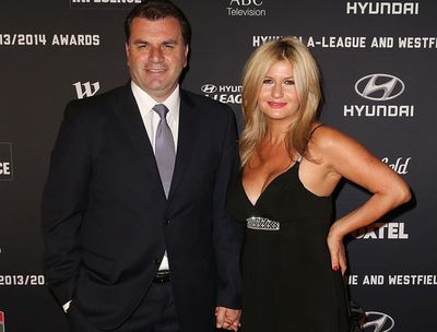 Socceroos coach Ange Postecoglou looked relaxed with Georgia Loupus.