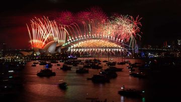 Fireworks light up the skies above Sydney Harbour at midnight on New Year&#x27;s Eve. 31st December 2022 