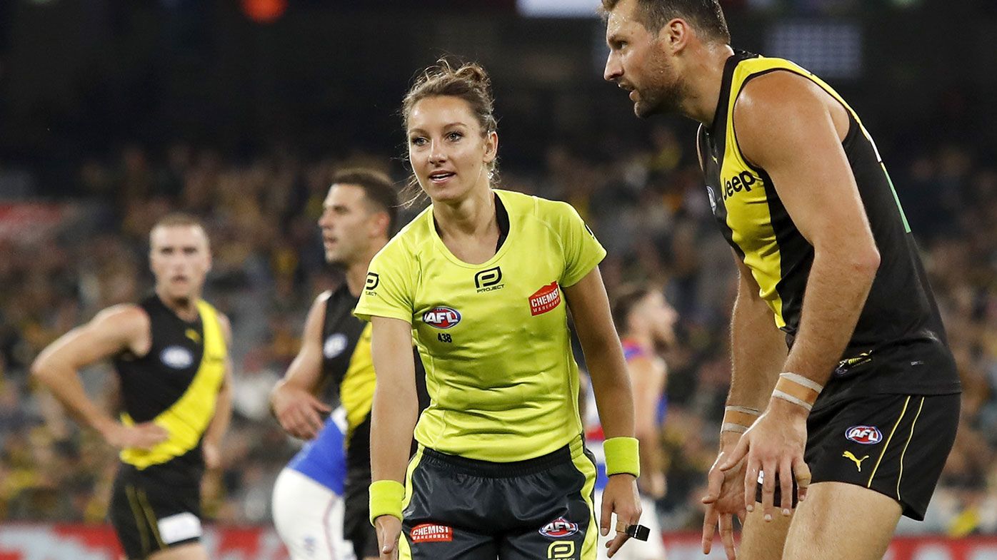 Umpire Eleni Glouftsis is seen directing the mark for Toby Nankervis of the in 2021