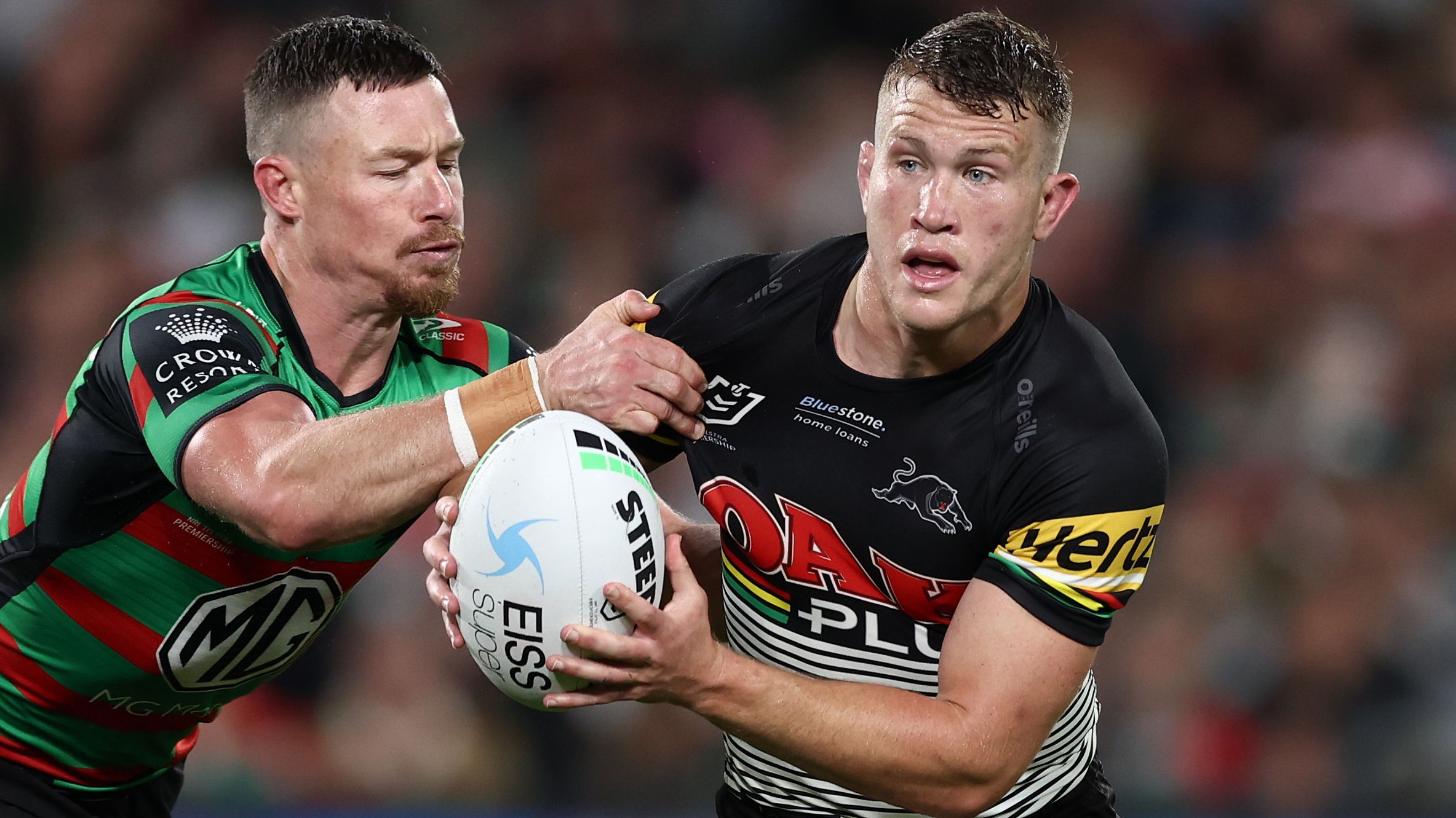South Sydney&#x27;s Damien Cook tackles Penrith hooker Mitch Kenny.
