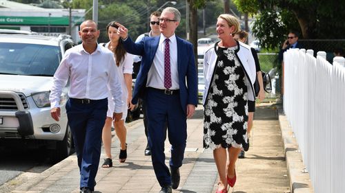 New South Wales Opposition Leader Michael Daley (centre) with Labor candidate for Heathcote Maryanne Stuart (right) and Legislative Council Candidate Mark Buttigieg (left) at Engadine train station in Sydney.