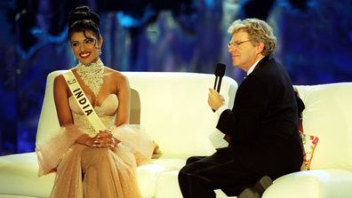 Miss India, Priyanka Chopra, 18, speaking with the host, Jerry Springer, during the Miss World contest at The Millennium Dome in Greenwich. 