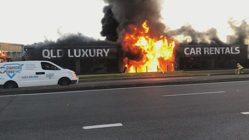 Police are investigating after a Gold Coast car dealership caught alight under suspicious circumstances.