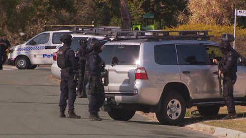 Police have locked down streets as officers negotiate with a man