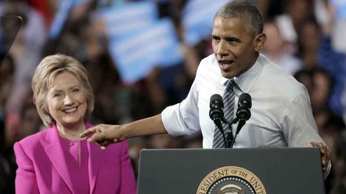 President Barack Obama campaigns for Hillary Clinton in Charlotte, North Carolina. (AP)