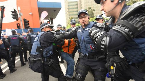 Capsicum spray used by riot police. (AAP)