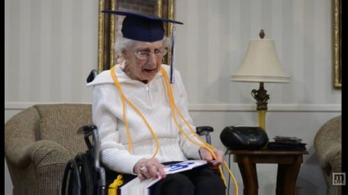 Elderly woman breaks down when presented with honorary high school degree 