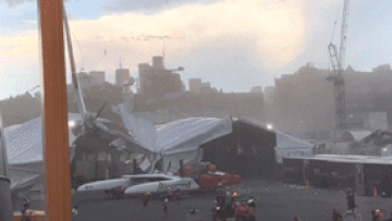 About 300 people have been evacuated in Sydney after dangerous weather hit the SailGP, lifting a catamaran into the air and bringing the event to a standstill.