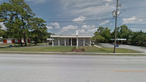 Gunman in custody following Florida bank siege